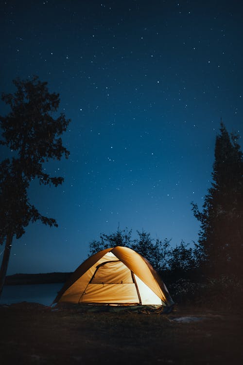 Campground with multiple RV sites and natural surroundings